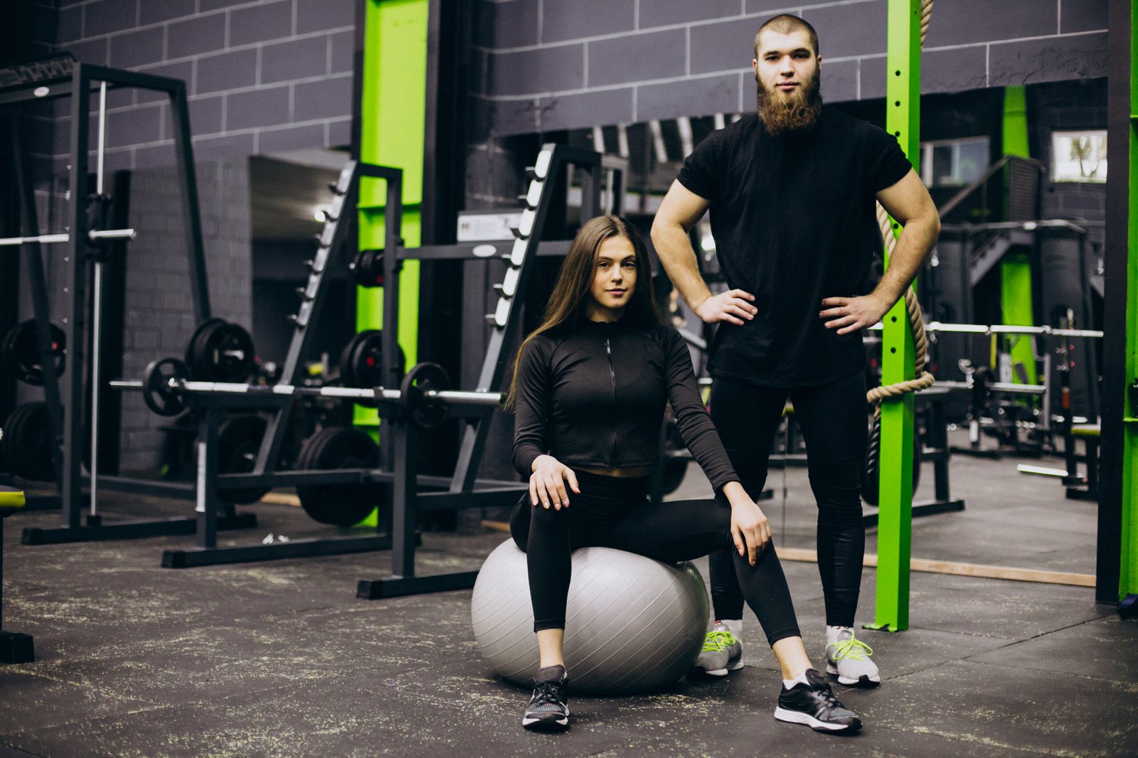 couple training together at the gym